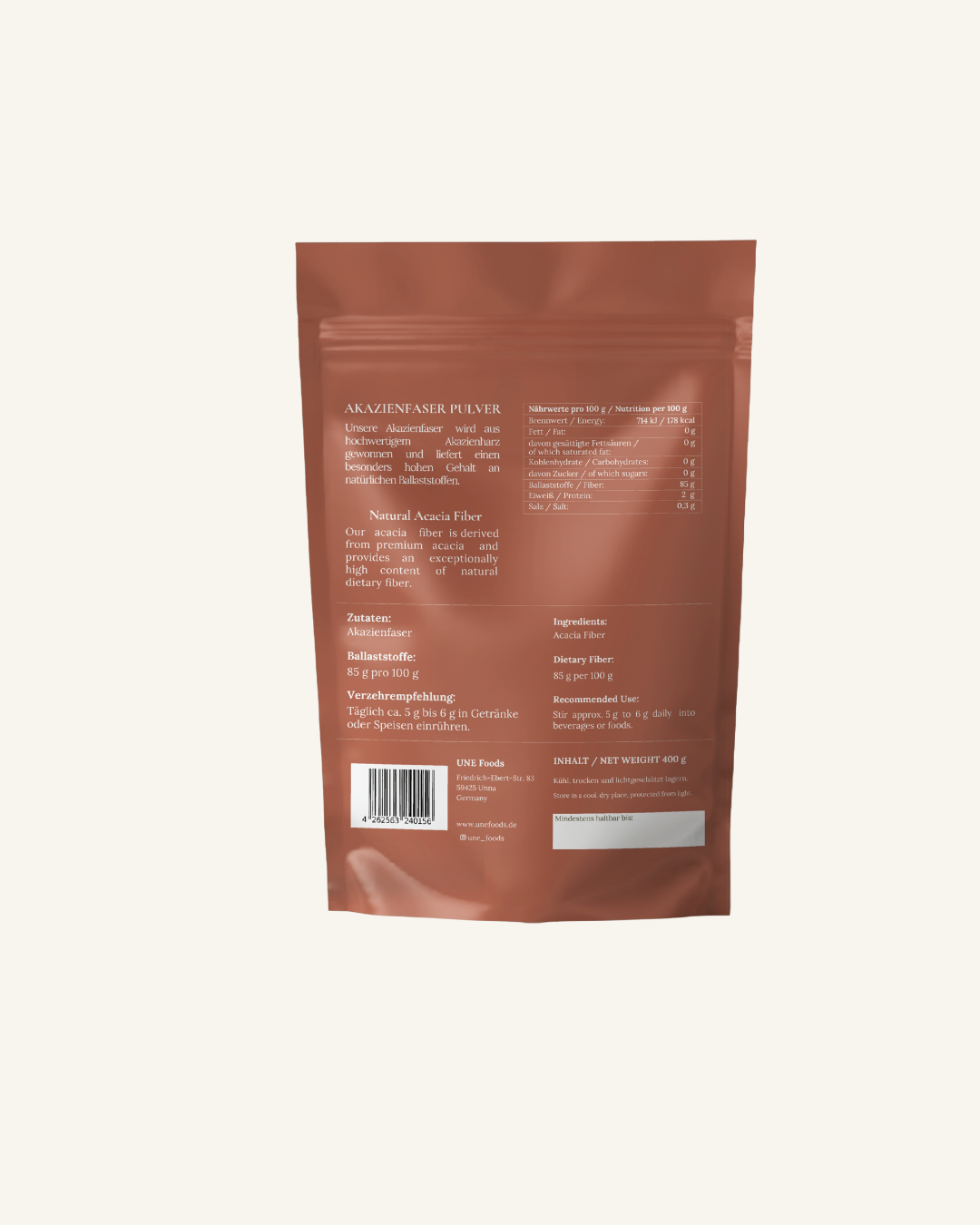 Rückseite der UNE Foods Akazienfaser Pulver Verpackung mit Zutaten, Nährwerttabelle, Verzehrempfehlung und 85 g Ballaststoffen pro 100 g.