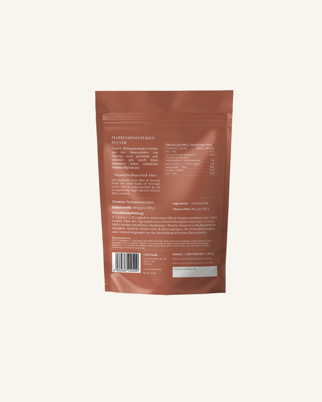 Rückseite der UNE Foods Flohsamenschalenpulver-Verpackung mit Zutaten, Nährwerttabelle, Verzehrempfehlung und 90 g Ballaststoffen pro 100 g.